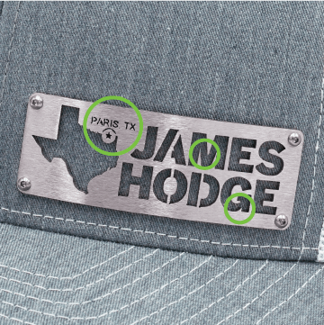 grey james hodge badgecap with 3 green circles highlighting detail of stainless steel metal laser cutting logo design